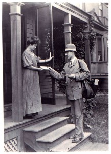 Letter Carrier Delivering Mail